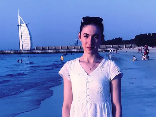 Wolsey Hall Oxford student, Evangelista, on a beach.