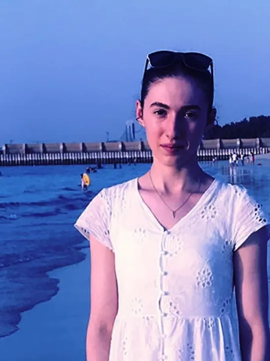 Wolsey Hall Oxford student, Evangelista, on a beach.