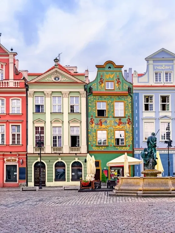 A landscape view of a variety of colourful and beautifully designed Polish buildings.