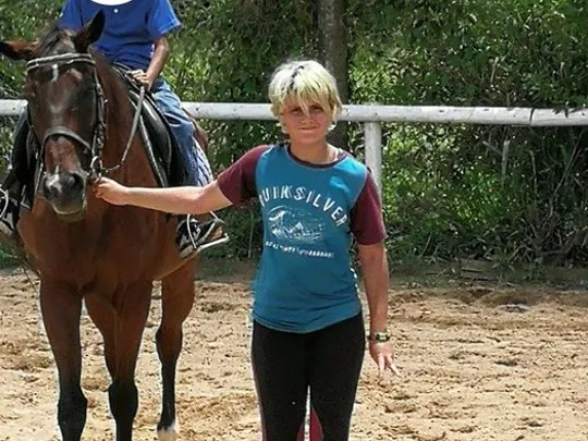 Wolsey Hall Oxford student, Reine, with a horse.