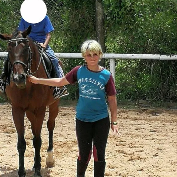 Wolsey Hall Oxford student, Reine, with a horse.