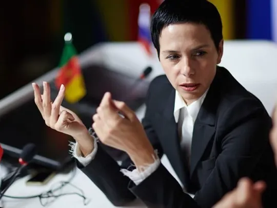 A country leader speaking at a political conference.