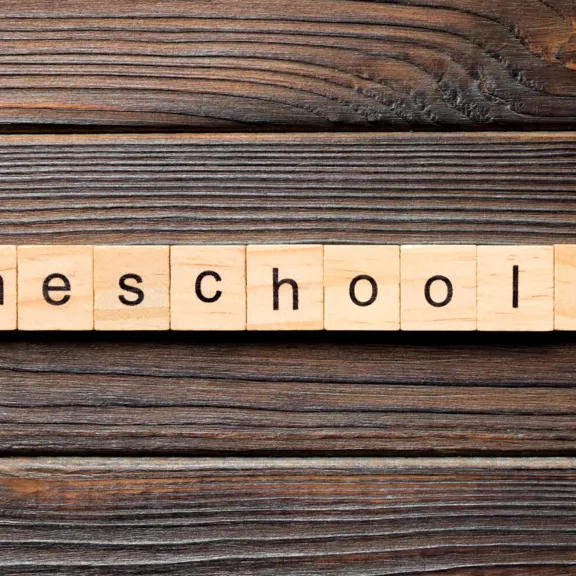 Homeschooling spelled out on wooden letters.