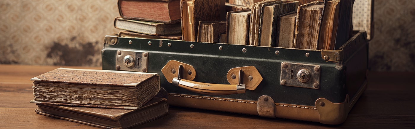 A suitcase with books inside. 