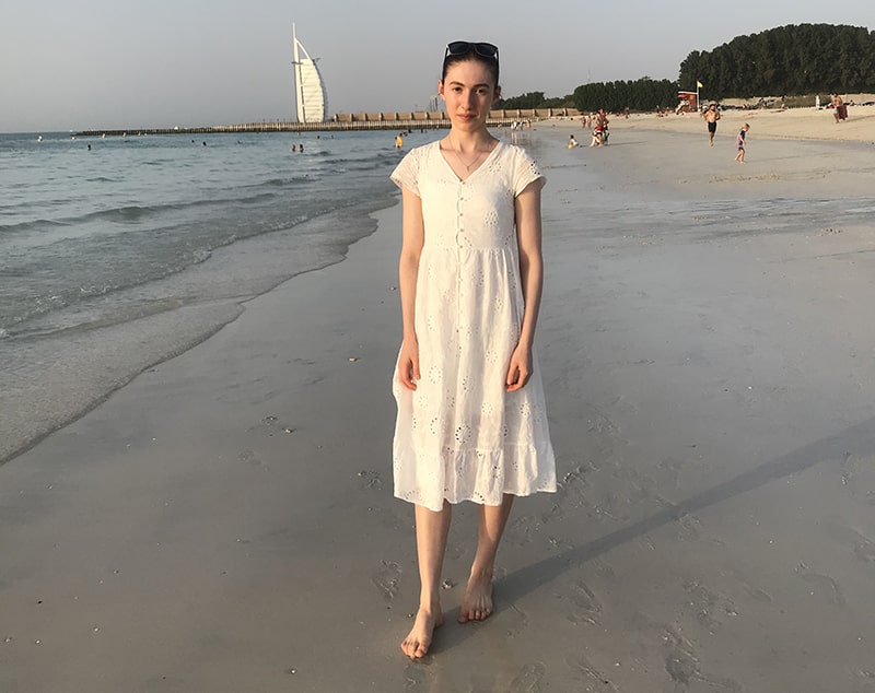 Wolsey Hall Oxford student, Evangelista, on a beach. 