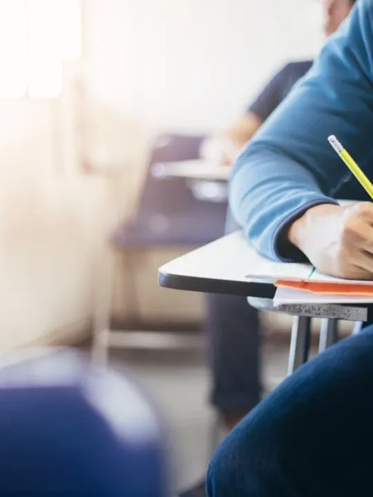 Someone sitting an exam paper.