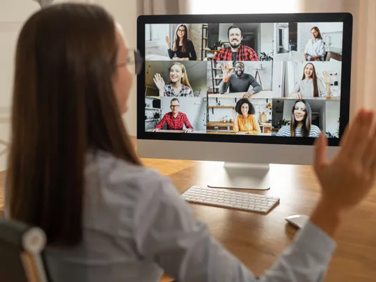 A team of colleagues collaborating effectively in a positive online work environment.