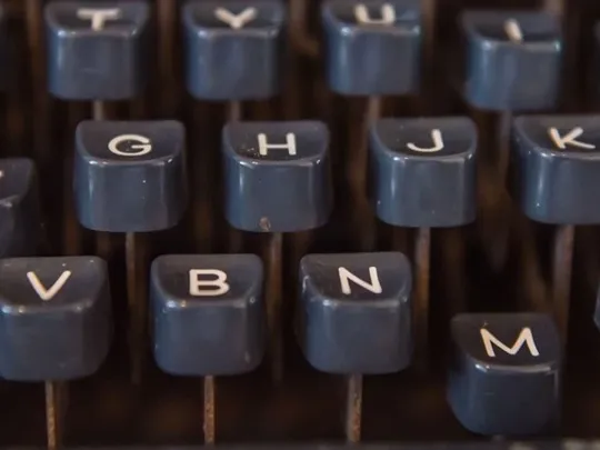 A close up of an old English typewriter.