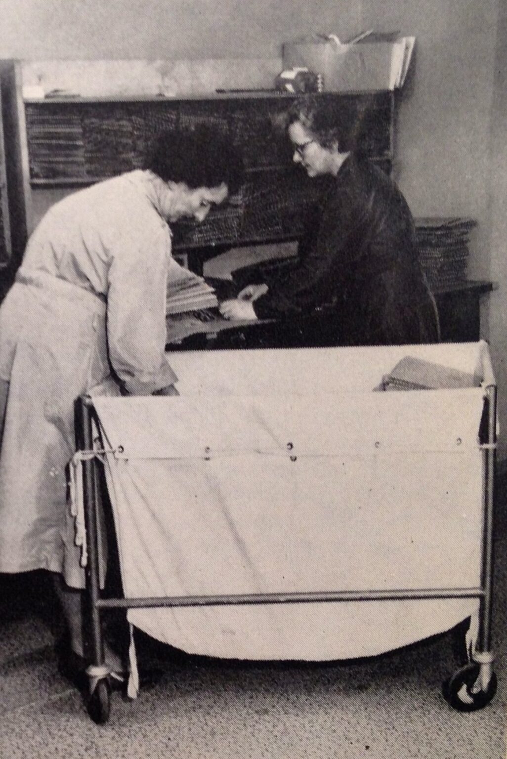 Two women preparing lessons for posting to all corners of the world. 