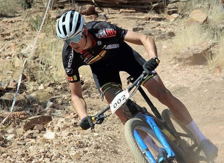Wolsey Hall Oxford student, Alex, cycling down hill. 