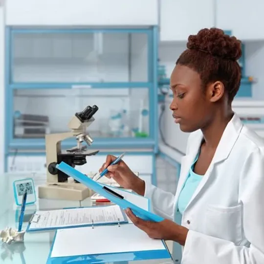A young scientist working in a lab.