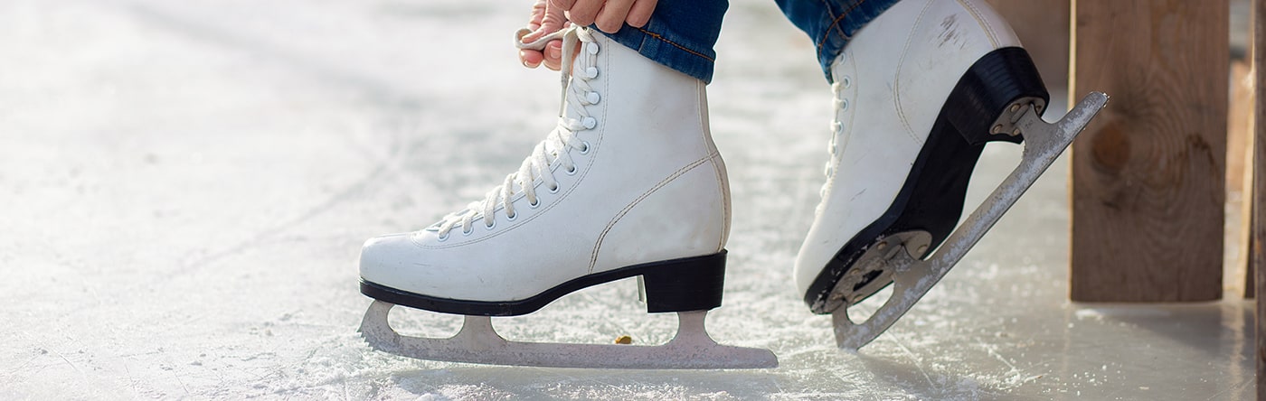 Ice skates on ice. 