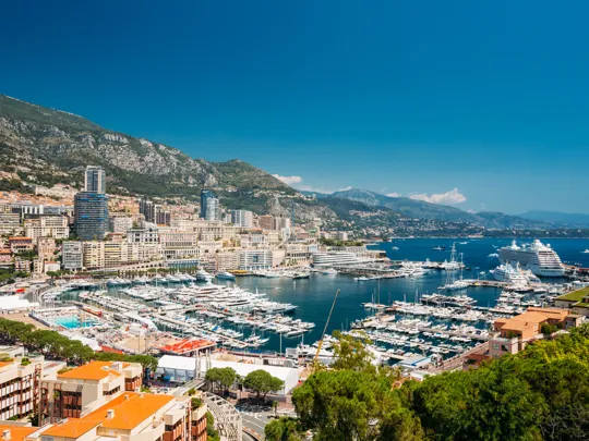 Landscape image of the Monte Carlo waterfront and harbour.