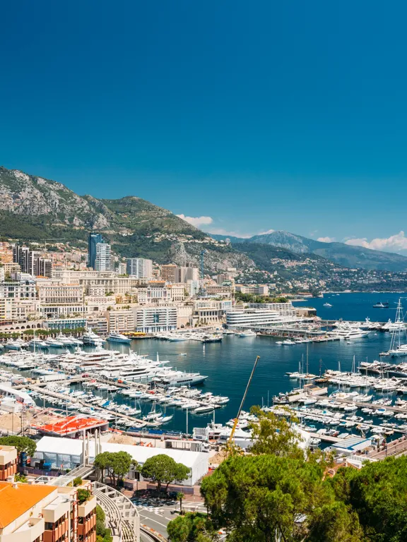 Landscape image of the Monte Carlo waterfront and harbour.