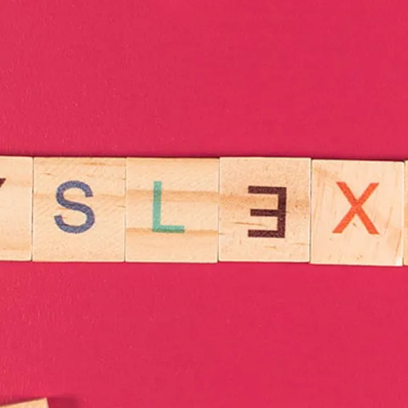 Dyslexia spelled out using wooden letters.