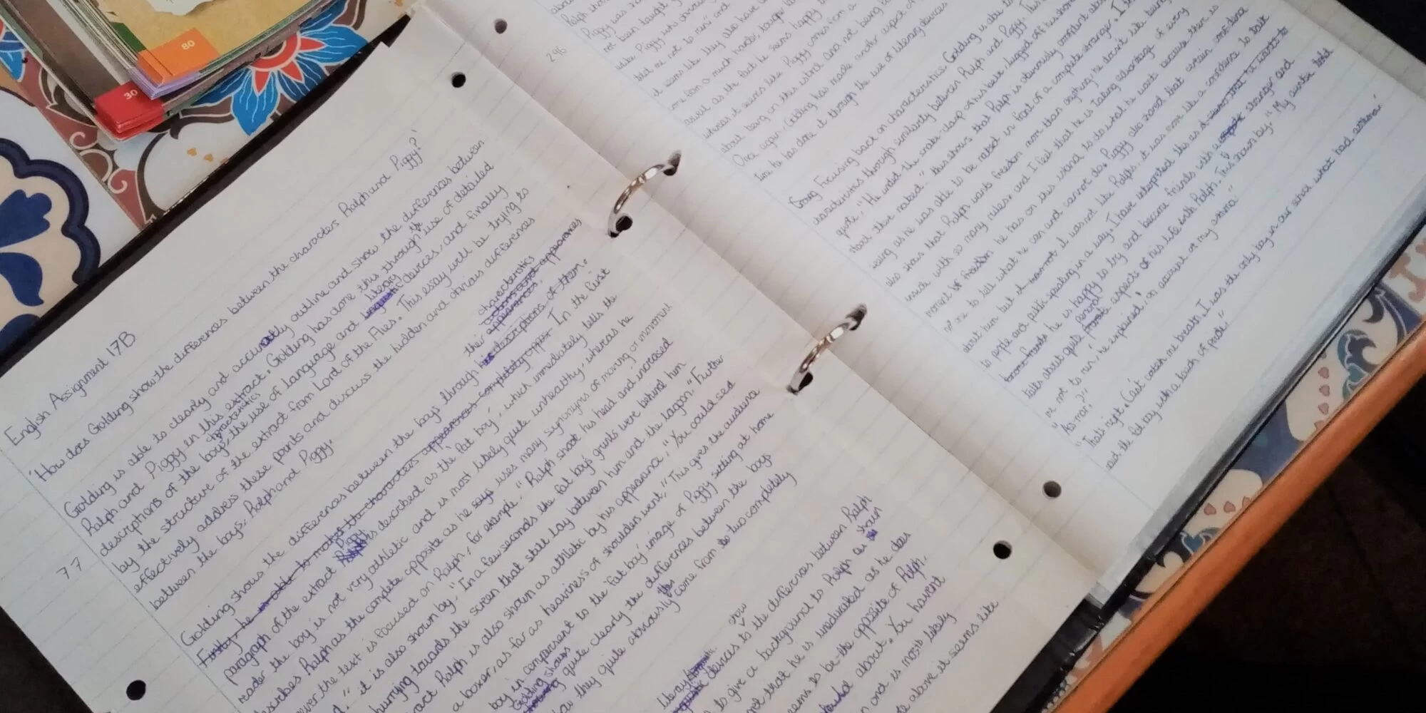 Study notes in a ring bound folder. 
