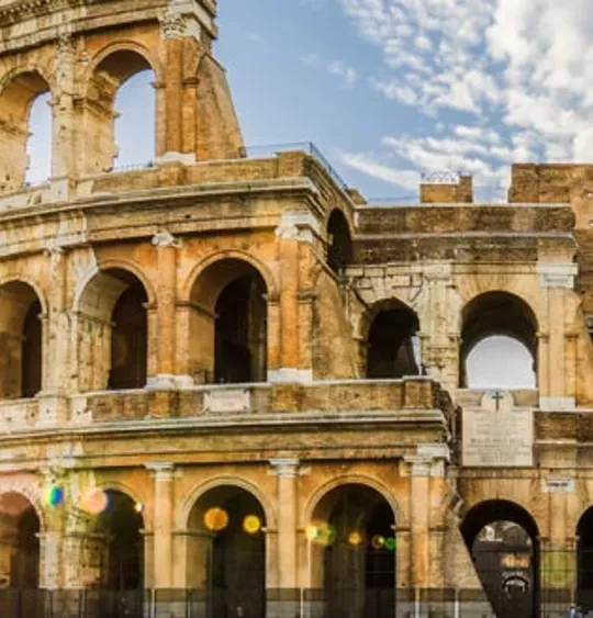 A landscape view of the Colosseum in Rome, Italy.