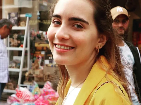 Wolsey Hall Oxford student Teyha smiling happily into the camera.