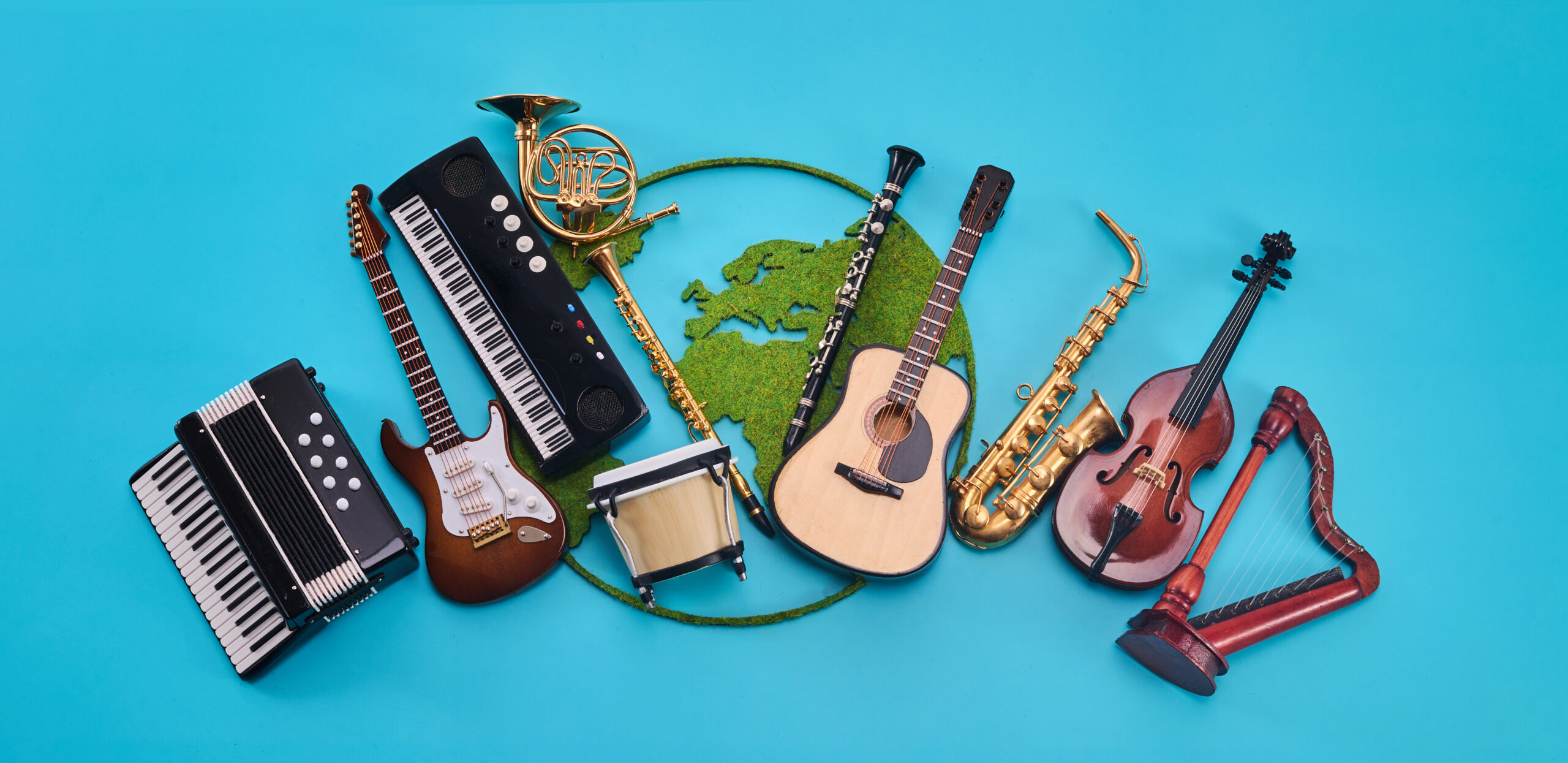 Collection of global musical instruments arranged in a semi-circle on a bright blue background.
