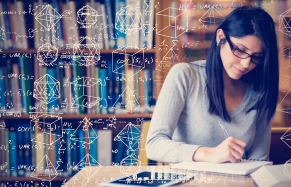 An older maths student studying, with digital illustrations of mathematic formulas laid over the image. 