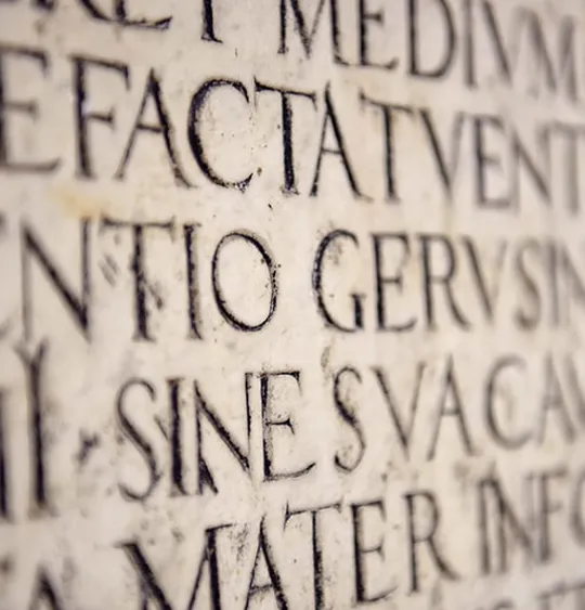 Image of old stone engravings.