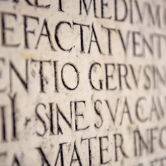 Image of old stone engravings.