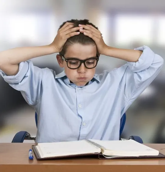 Young male child, deeply exhaling.