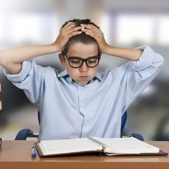 Young male child, deeply exhaling.