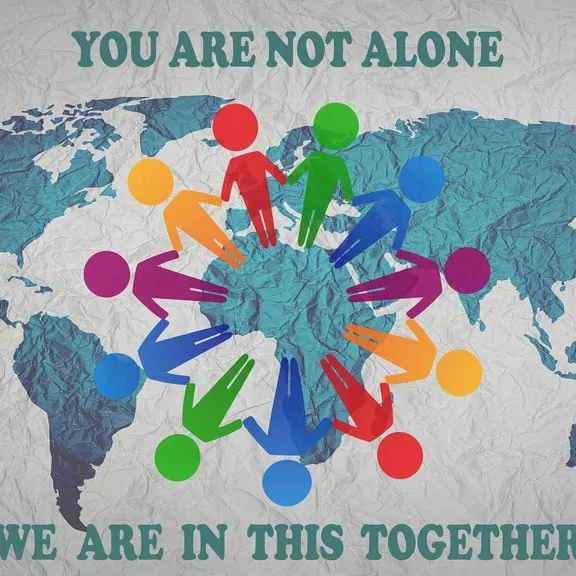 A poster that reads; 'You are not alone, we are in this together'.